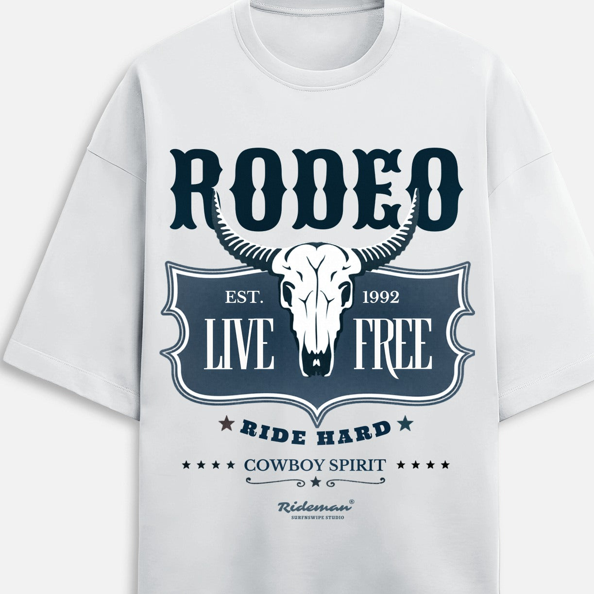 Front view of white t-shirt with 'Rodeo Live Free' design in a living room.