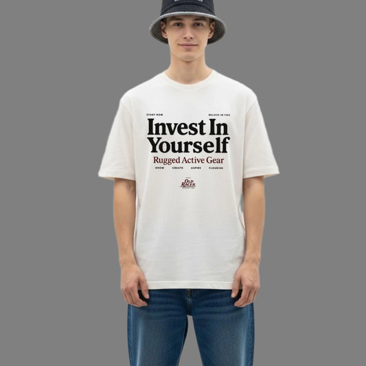 Person wearing a white t-shirt with text and blue jeans on a white background