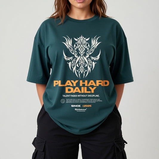 Person wearing a green t-shirt with a graphic design and text on a plain background