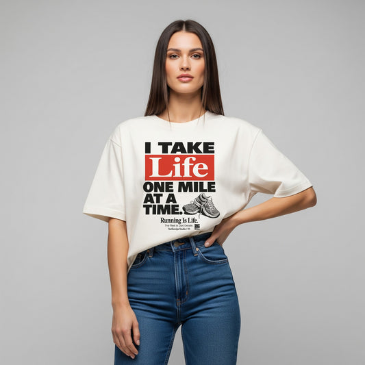 Woman wearing a white t-shirt with a motivational quote on a gray background