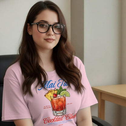 Woman wearing a pink t-shirt with a cocktail design and text.