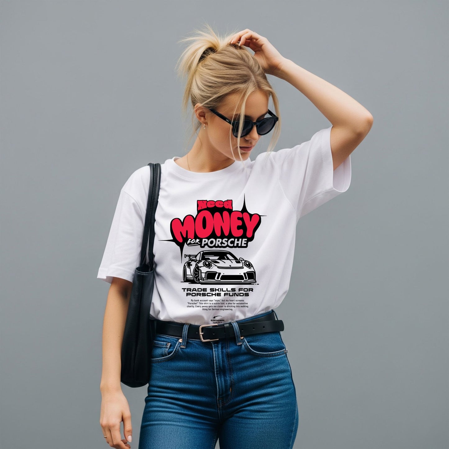 Woman wearing a white t-shirt with a graphic design on a gray background