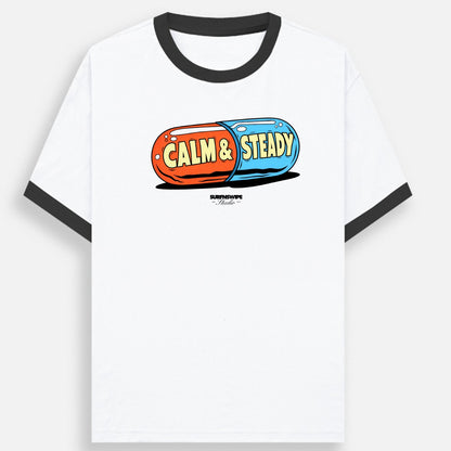 White t-shirt with colorful 'Calm & Steady' graphic design on a white background