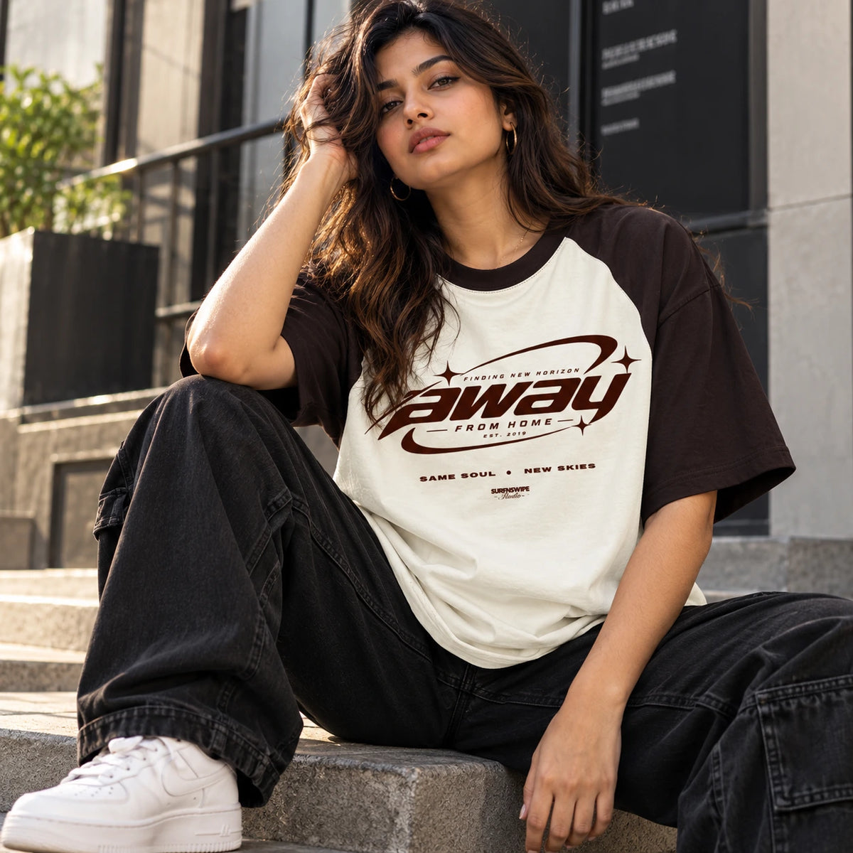 Woman wearing Maroon and off white colour block oversized t-shirt by SURFNSWIPE