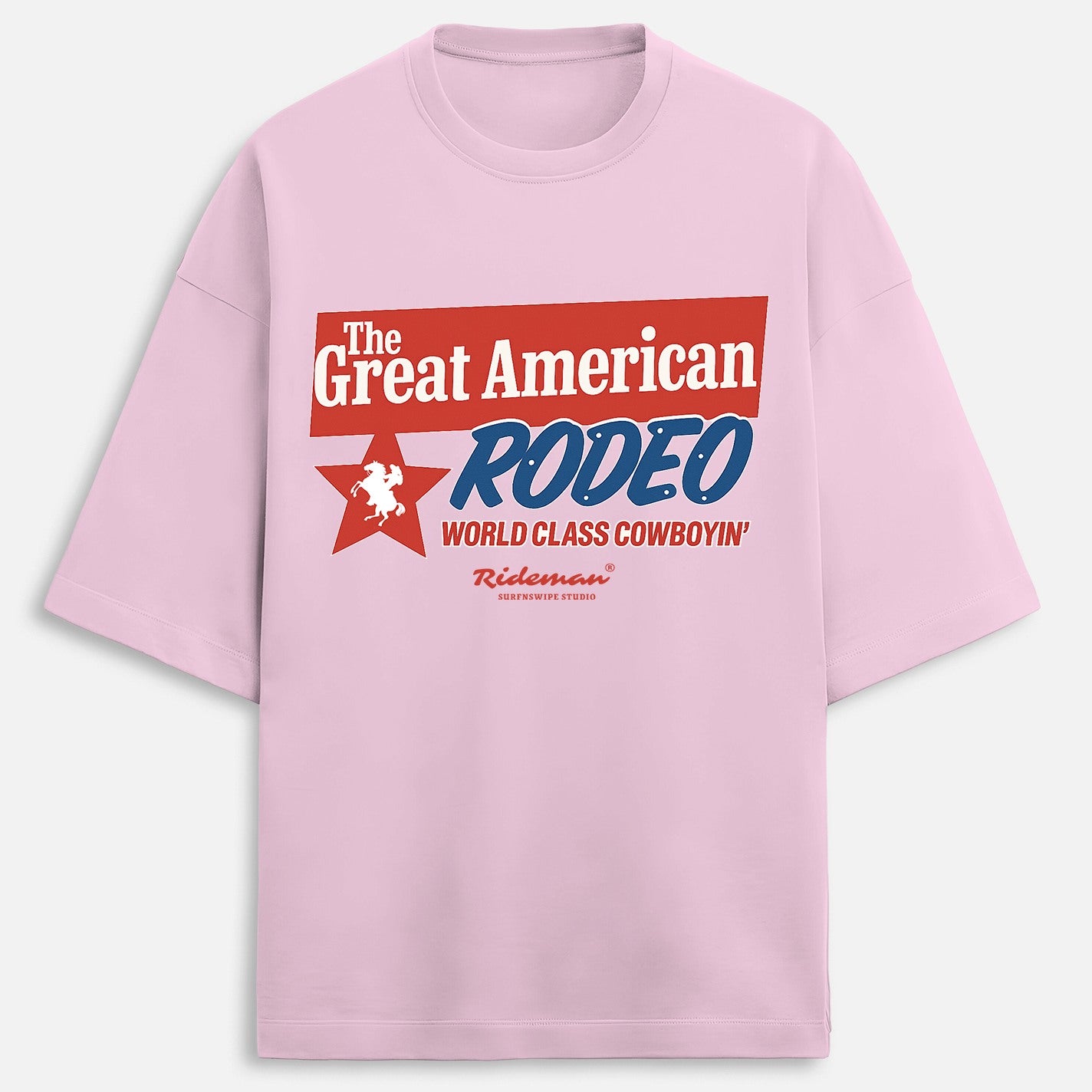 Close up of Pink t-shirt with 'The Great American Rodeo' graphic on a white background