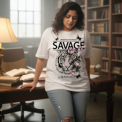 Woman wearing a 'SAVAGE' t-shirt with a tiger design in a home office setting