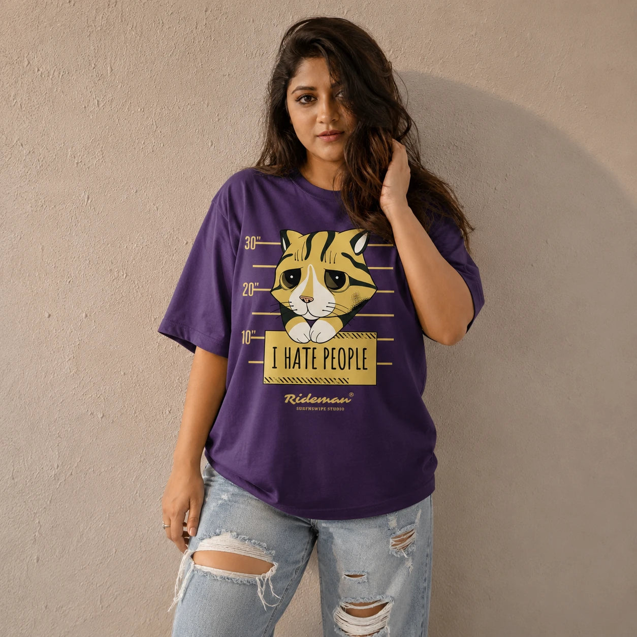 Model wearing I Hate People grumpy cat mugshot graphic printed oversized unisex t-shirt in black – 240 GSM brushed fleece cotton, Surfnswipe Studio
