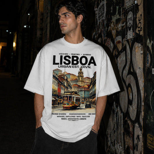 Person wearing a t-shirt with 'Lisboa' design standing against a graffiti-covered wall.