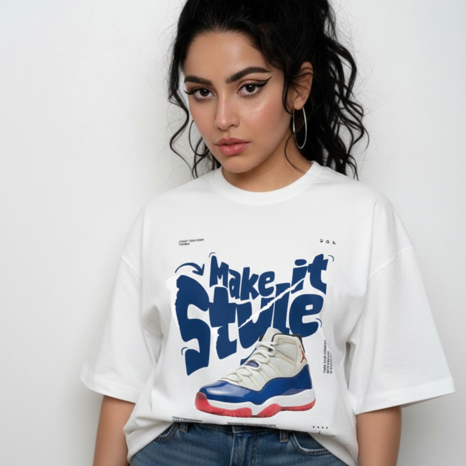 Person wearing a white t-shirt with a graphic of a sneaker and text on a plain background