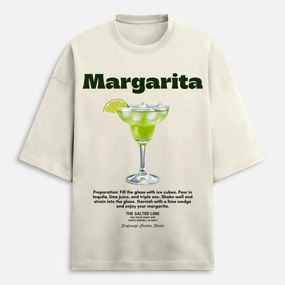 Beige t-shirt with margarita graphic and text on a white background