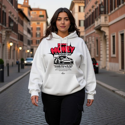 Woman wearing a white hoodie with a graphic design on a city street