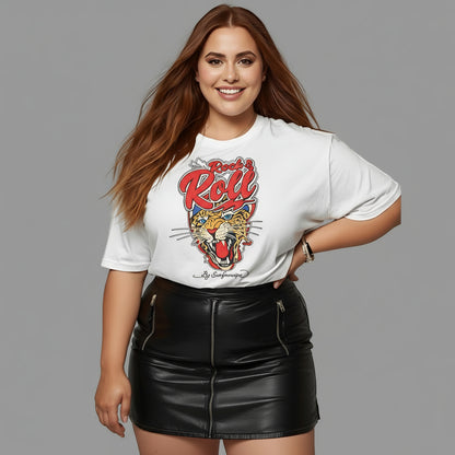 Woman wearing a white t-shirt with a graphic design and a black leather skirt on a plain background