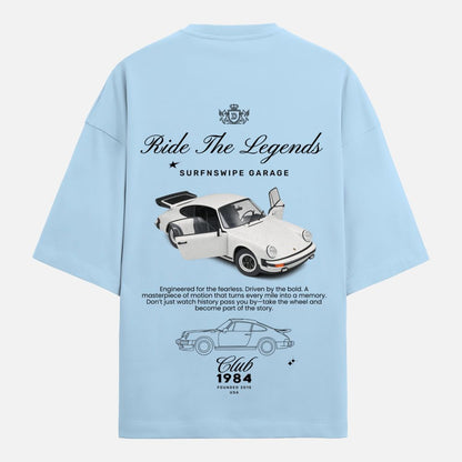 Light blue t-shirt with car graphics and text on the back