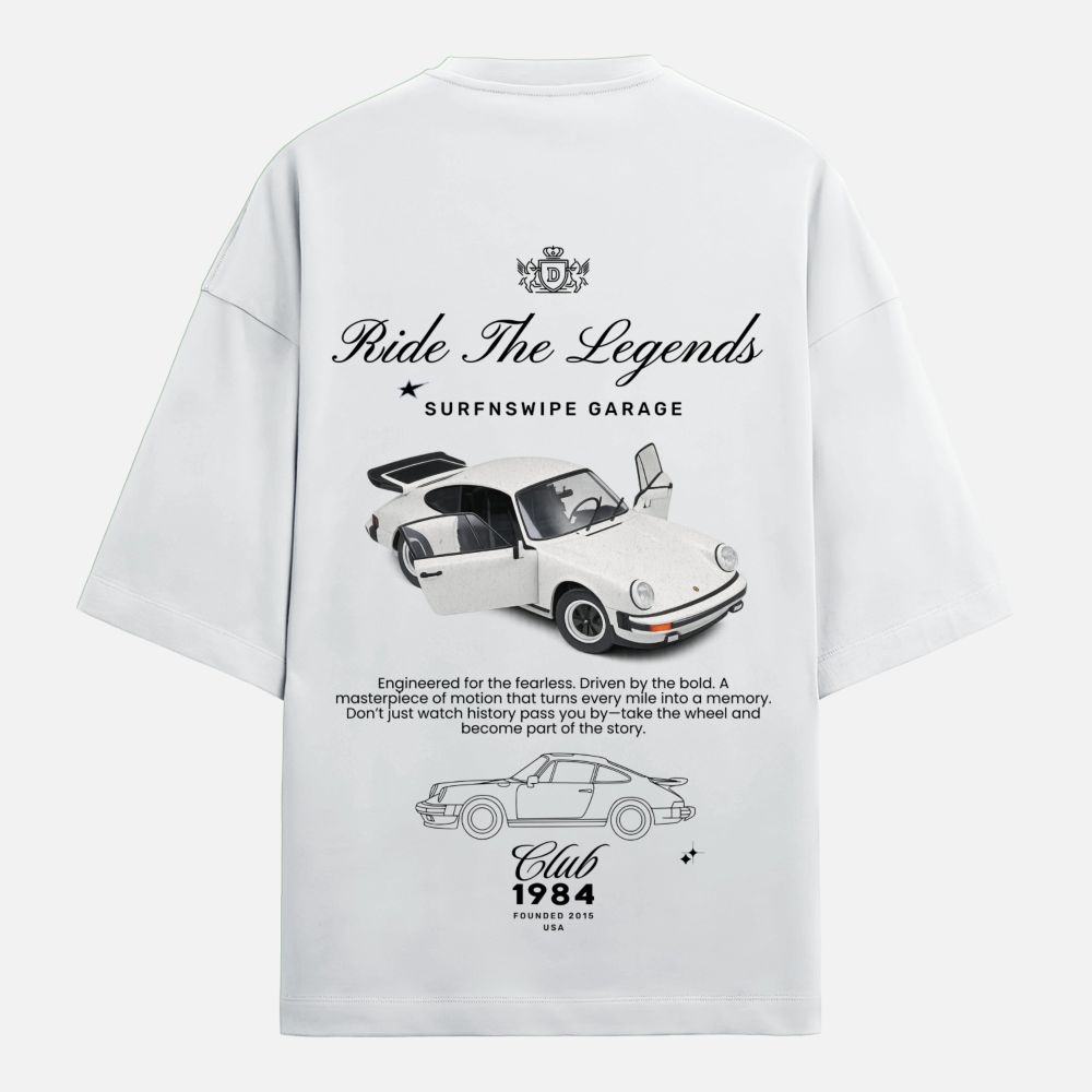 White t-shirt with car graphic and text on a white background