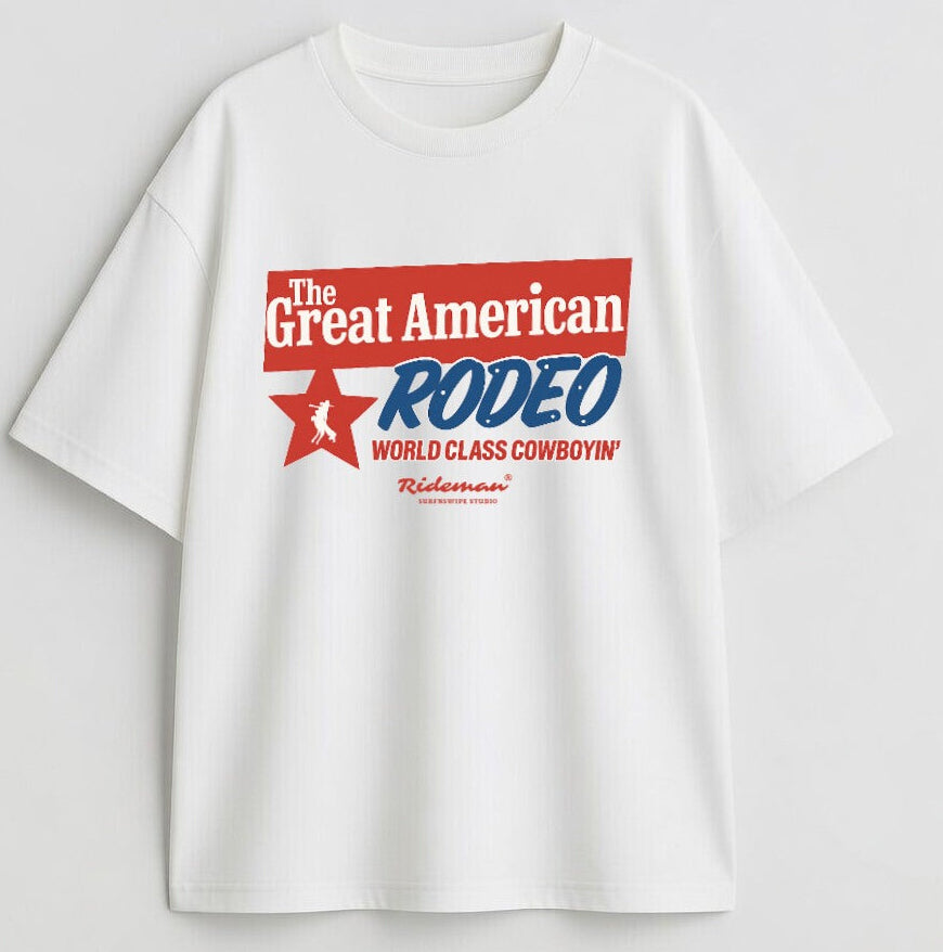 White t-shirt with 'The Great American Rodeo' graphic design on a light gray background