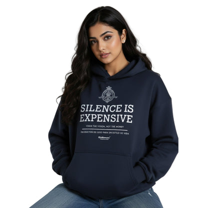 Woman wearing a navy hoodie with 'Silence is Expensive' text on a white background