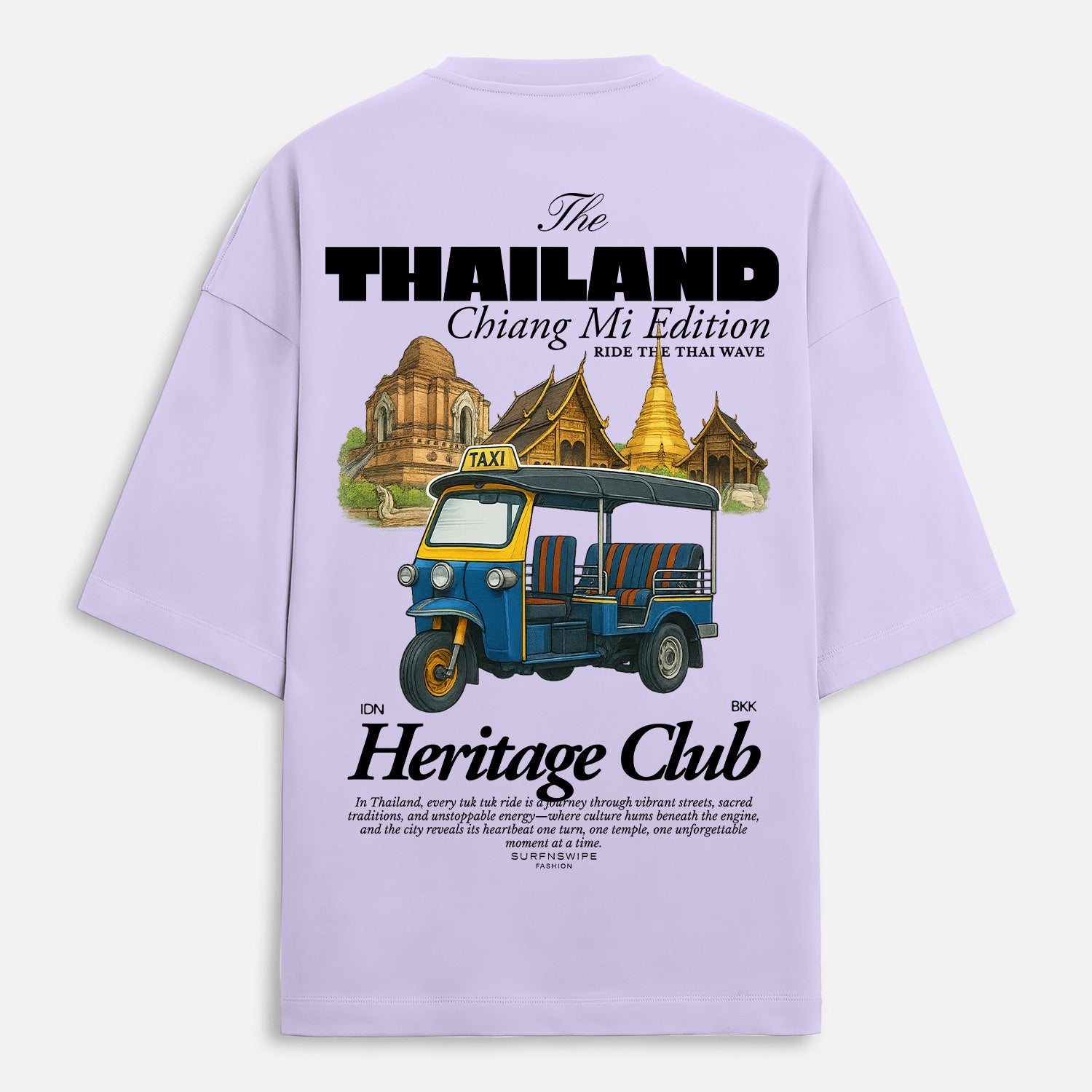 Lavender t-shirt with a graphic of a tuk-tuk and temple, featuring text about Thailand and Chiang Mi.