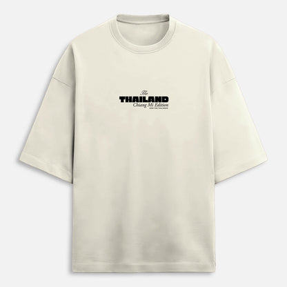 Beige t-shirt with black text on a white background