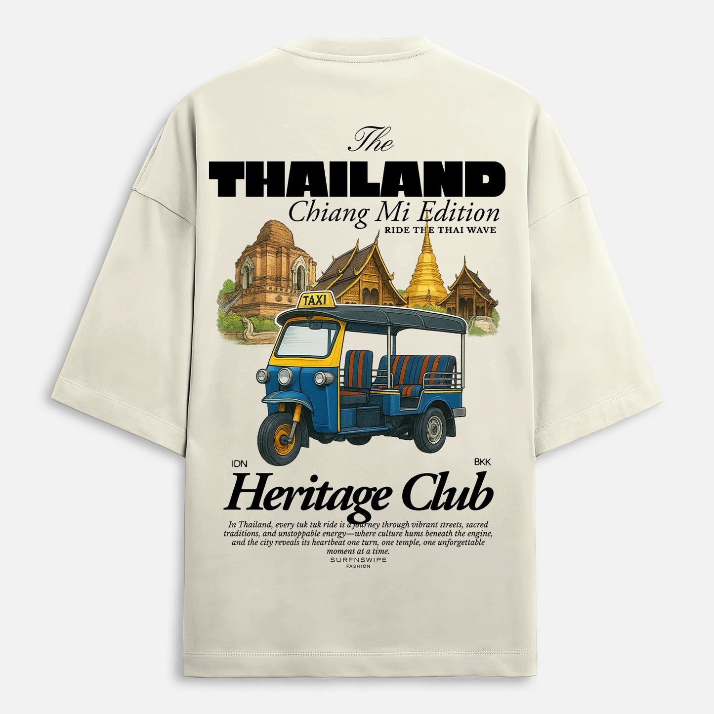 Beige t-shirt with a graphic of a tuk-tuk and Thai temple, featuring text about Thailand and Chiang Mai.