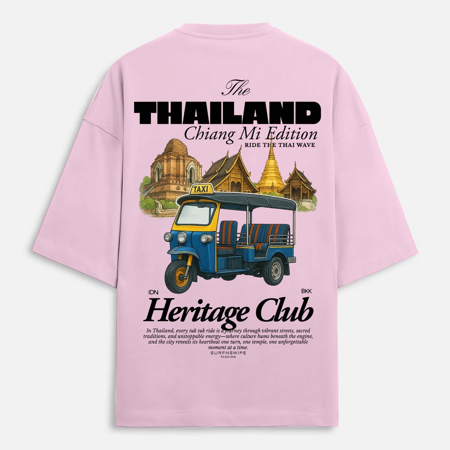 Pink t-shirt with a graphic of a tuk-tuk and temple, featuring text about Thailand and Chiang Mi.