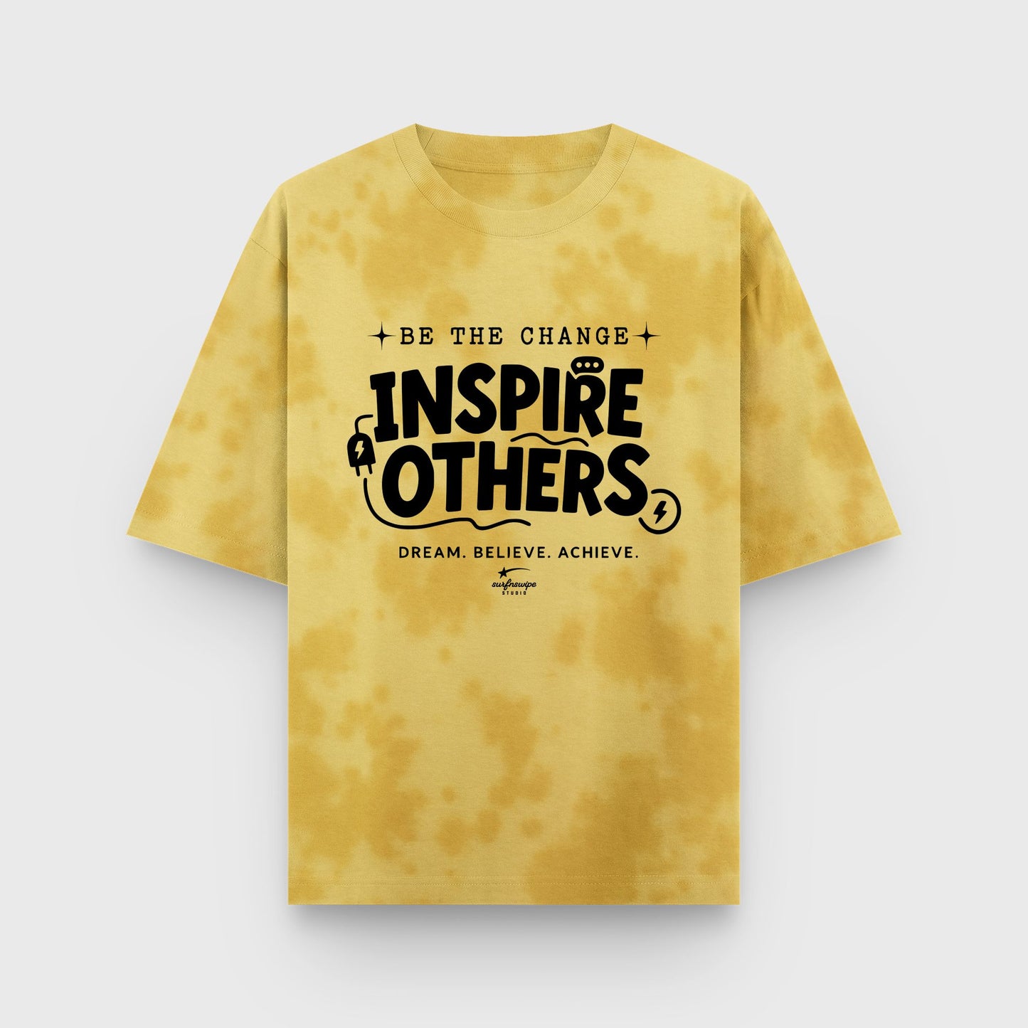 Yellow tie-dye t-shirt with motivational text on a white background