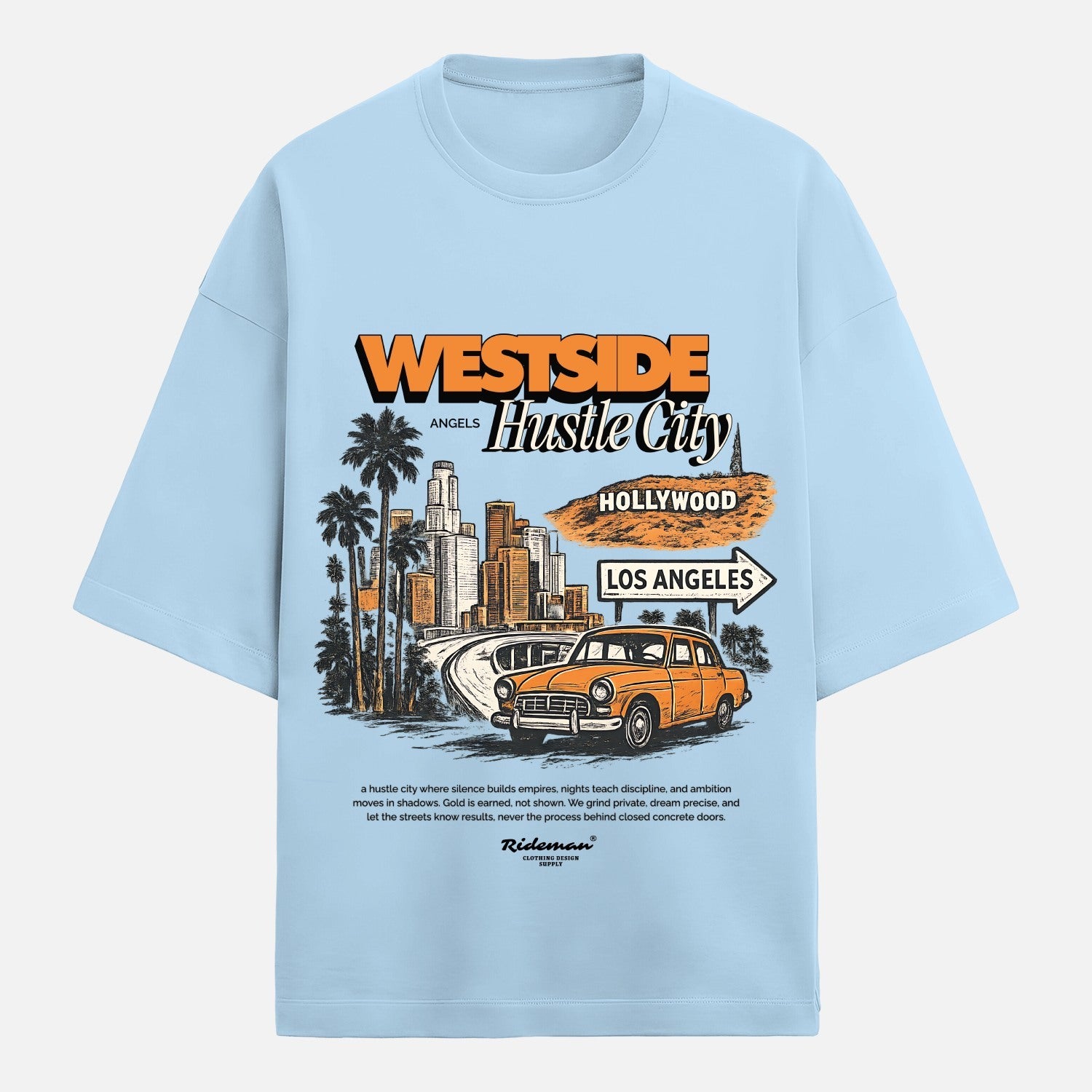Light blue t-shirt with a graphic design of a cityscape, car, and text on a white background