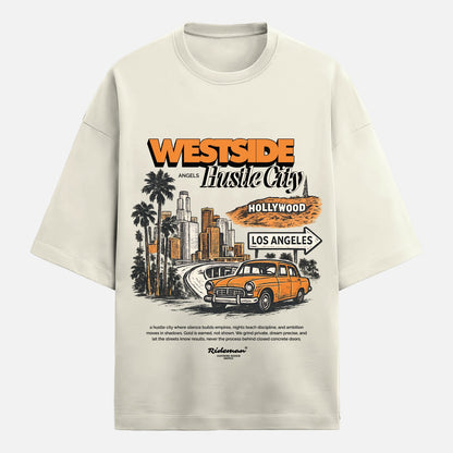 Beige t-shirt with 'Westside Hustle City' graphic design featuring a car, palm trees, and cityscape.