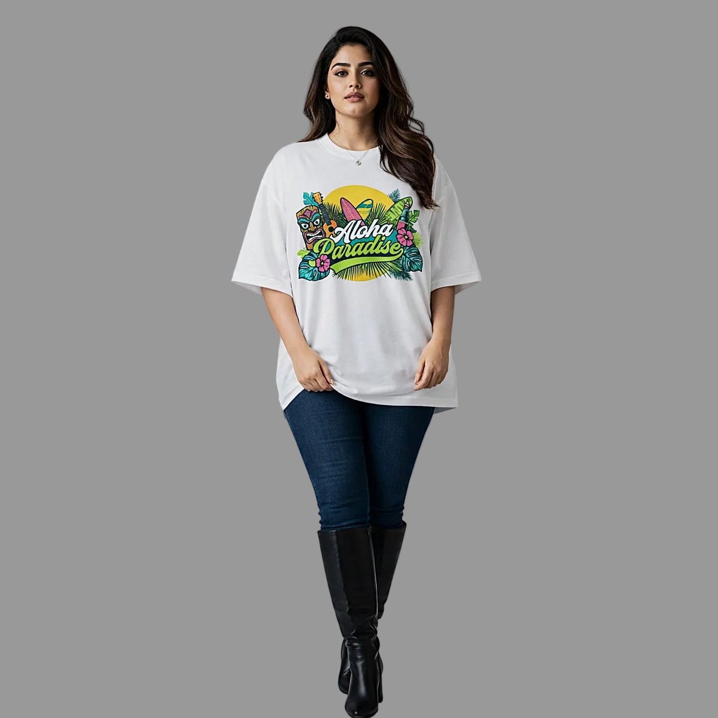 Woman wearing a white t-shirt with colorful graphics and text, standing against a plain background