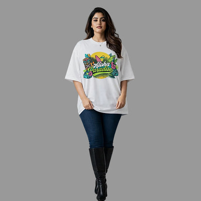 Woman wearing a white t-shirt with colorful graphics and text, standing against a plain background