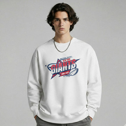 Person wearing a white sweatshirt with a sports team logo on a gray background
