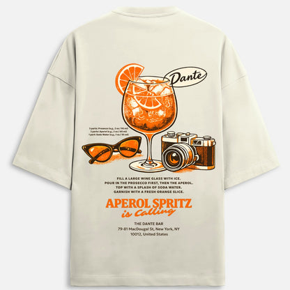 Beige t-shirt with Aperol Spritz graphic and branding on a white background