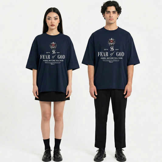 Two people wearing navy blue t-shirts with 'Fear of God' text on a white background