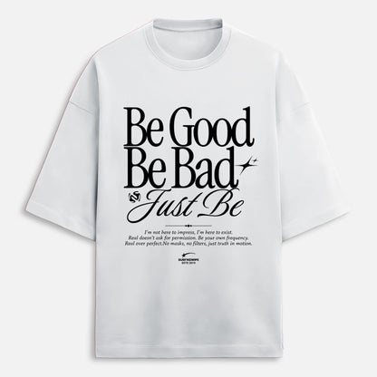 White t-shirt with black text on a white background
