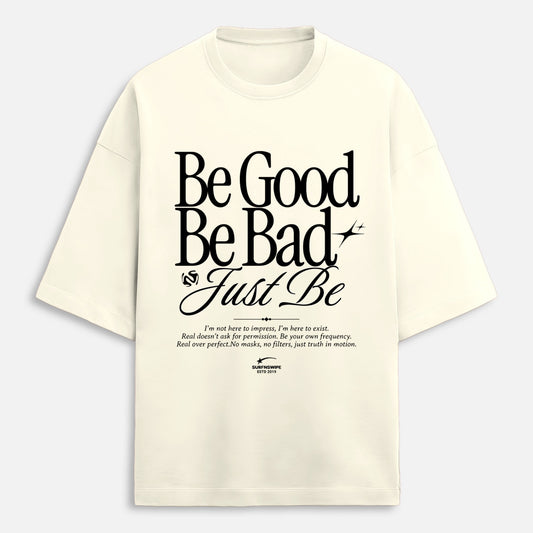 Beige t-shirt with black text on a light gray background