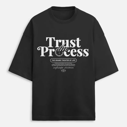 Black t-shirt with 'Trust the Process' text on a white background
