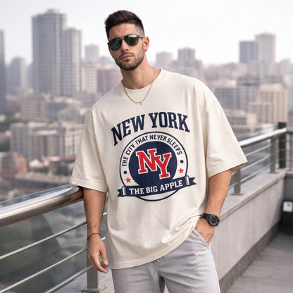 Man wearing a 'New York' t-shirt with a cityscape background