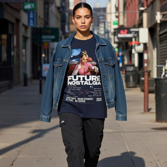 Person wearing a denim jacket and graphic t-shirt on a city street