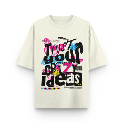 Beige t-shirt with colorful text design on a white background