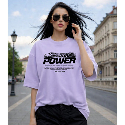 Woman wearing a lavender t-shirt with text on a city street