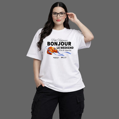 Woman wearing a white t-shirt with text and graphics on a gray background