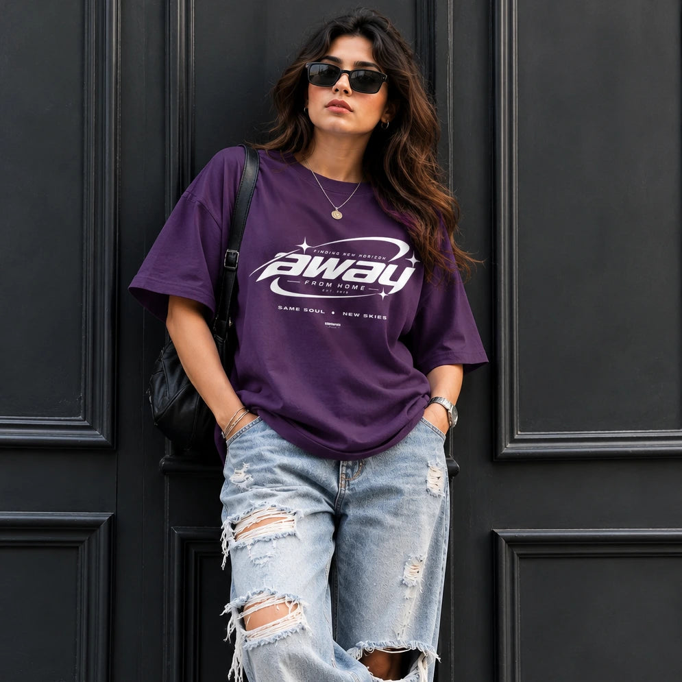 Model wearing the purple Away From Home oversized T-shirt
