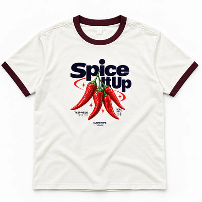 Close-up of Spice It Up red chili graphic with navy lettering on ringer T-shirt