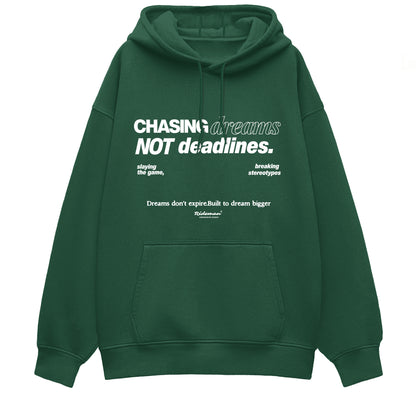 Green hoodie with motivational text on a white background