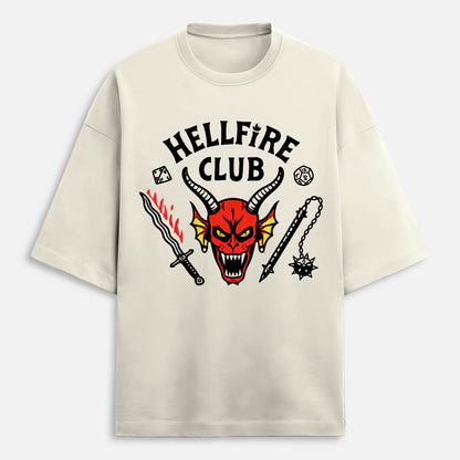 Beige t-shirt with 'Hellfire Club' graphic design featuring a devil face and weapons on a white background.