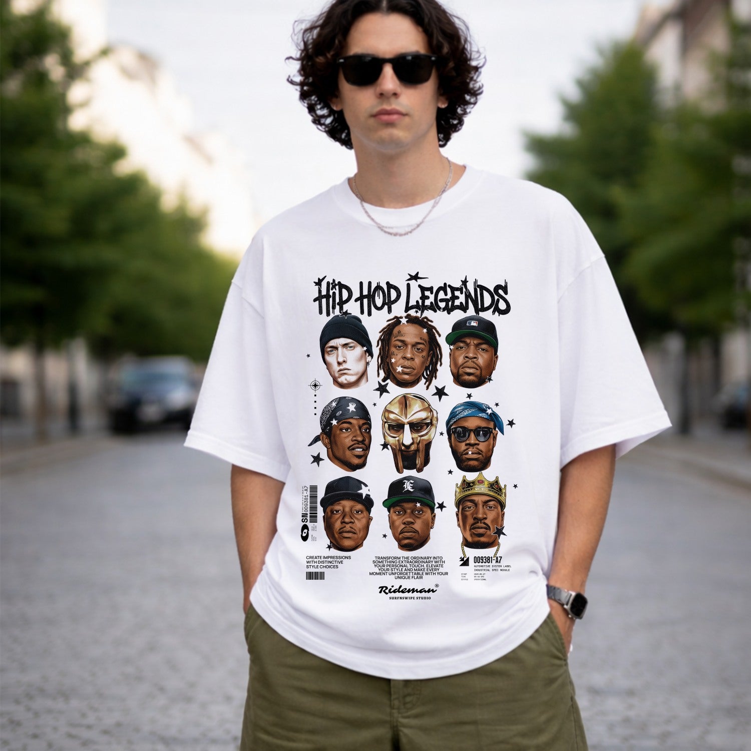 Person wearing a white t-shirt with 'Hip Hop Legends' graphic design outdoors.