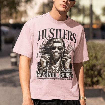 A person wearing a white oversized fit t-shirt with a graphic print in the center.