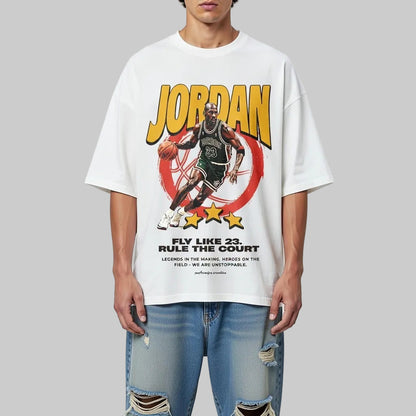 Person wearing a white t-shirt with a Jordan graphic design on a plain background