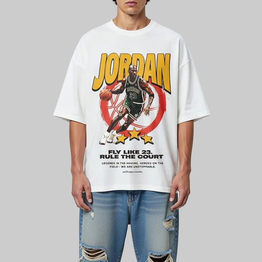 Person wearing a white t-shirt with a Jordan graphic design on a plain background