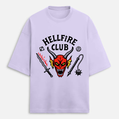 Lavender t-shirt with 'Hellfire Club' graphic design featuring a devil face and weapons on a white background.