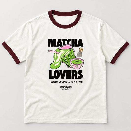 An off-white ringer t-shirt with dark maroon collar and sleeve cuffs, featuring a 'Matcha Lovers' graphic print on the front.
